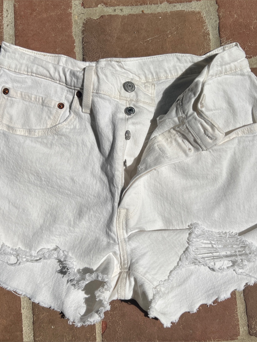 Levi's White Distressed Denim Cutoff Shorts